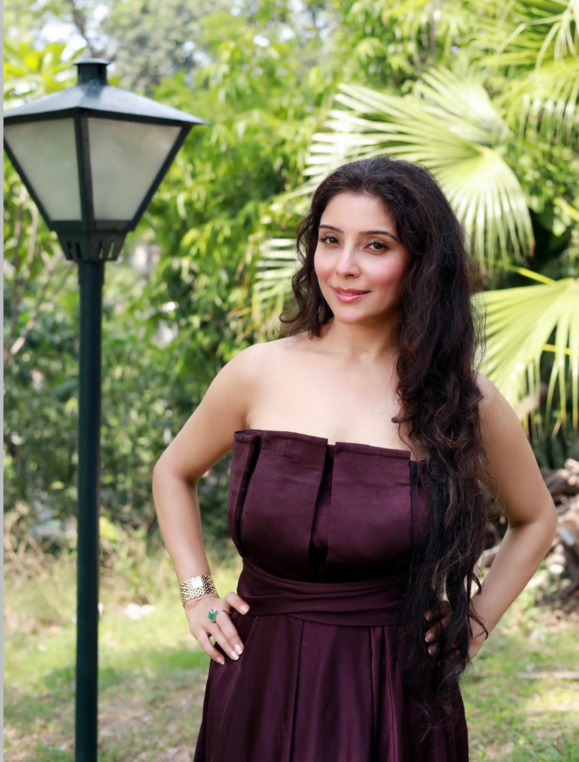 Jai Madaan in our Merlot Box Pleat Maxi Dress